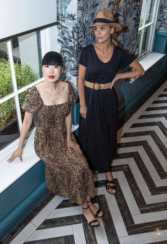 Midi dresses with button - down skirts for a unique and functional design Leo Print Dress