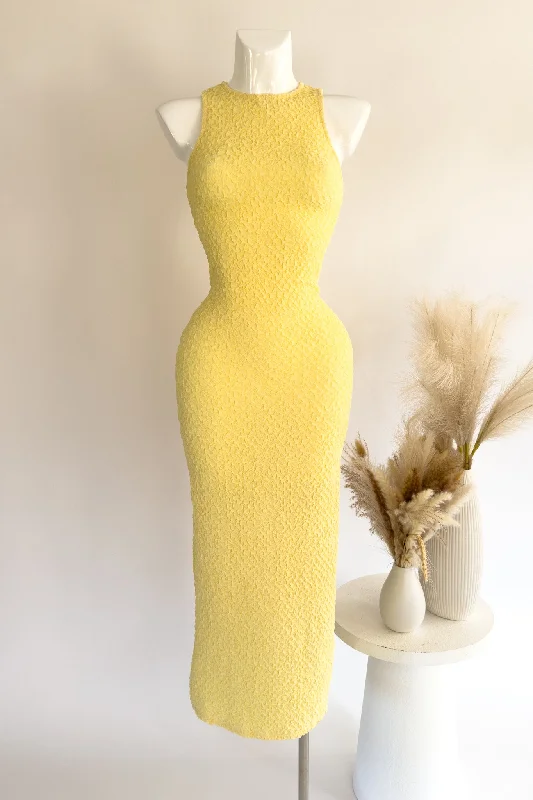 Midi dresses with ruffled sleeves for a more feminine and voluminous look Hana Midi Dress - Yellow Midi dresses with ruffled sleeves for a more feminine and voluminous look Hana Midi Dress - Yellow