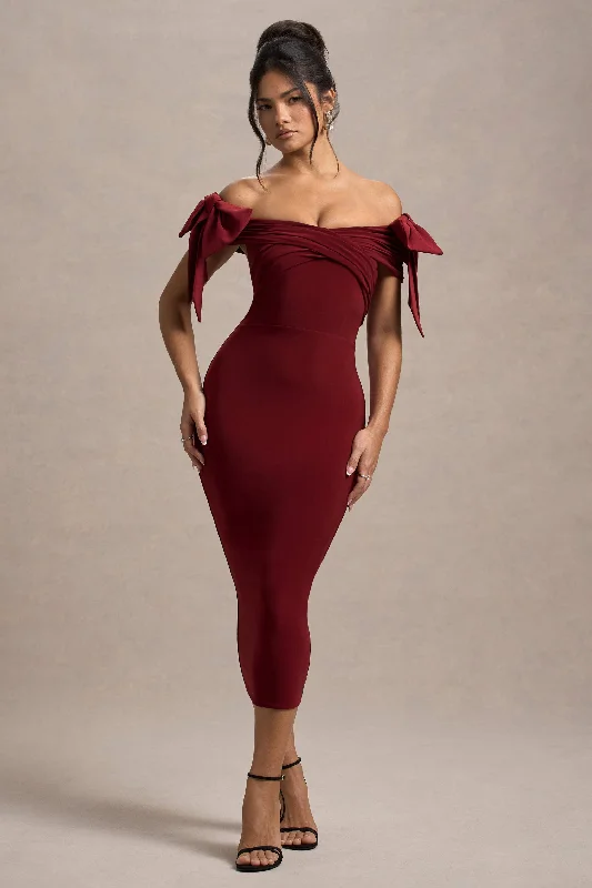 Midi dresses with geometric cutouts for a contemporary and edgy look Ashleigh | Port Bardot Midi Dress With Bows Midi dresses with geometric cutouts for a contemporary and edgy look Ashleigh | Port Bardot Midi Dress With Bows