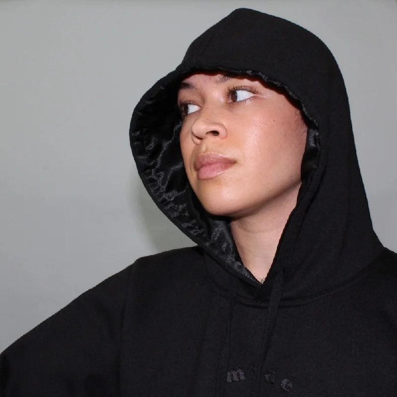 Women's pullover hoodie with a side slit for a modern and relaxed fitSatin Lined Hoodie - Black
