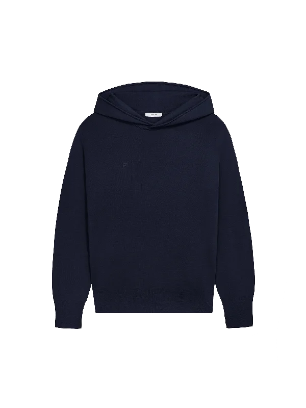 Women's hoodie with a glittery print for a glamorous and sparkly appearanceWomens Regenerative Merino Wool Hoodie—navy Women's hoodie with a glittery print for a glamorous and sparkly appearanceWomens Regenerative Merino Wool Hoodie—navy