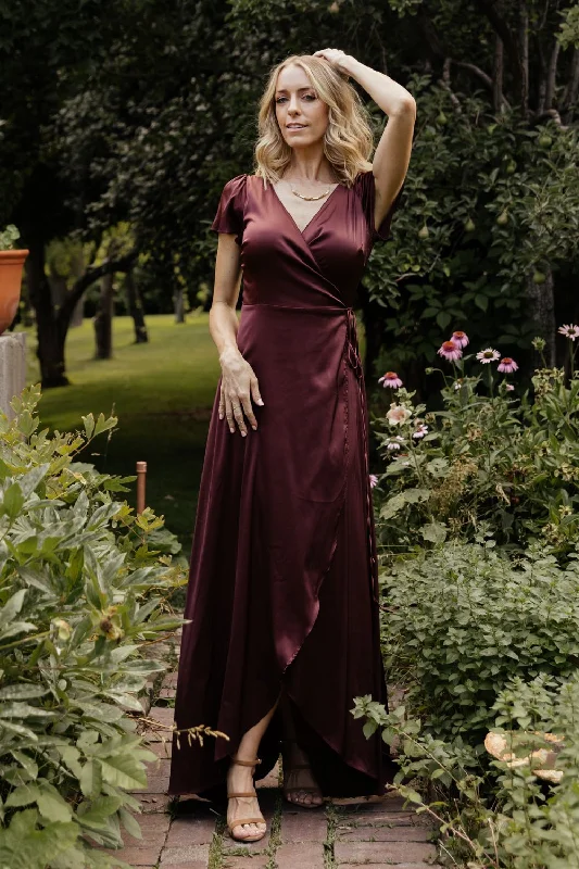 Maxi dresses with bow accents at the waist for a sweet appearanceKrystal Satin Wrap Gown | Dark Clove Maxi dresses with bow accents at the waist for a sweet appearanceKrystal Satin Wrap Gown | Dark Clove