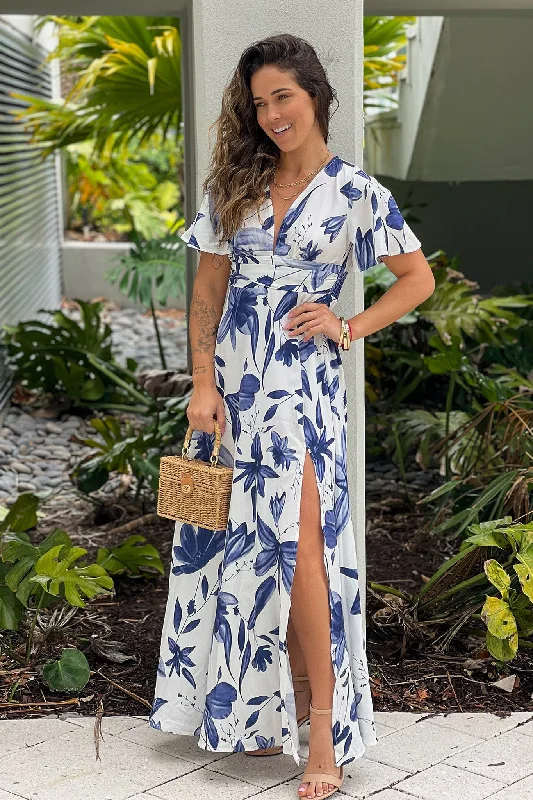 Metallic maxi dresses for a glamorous New Year's Eve partyOff White And Blue Floral Maxi Dress With Slit