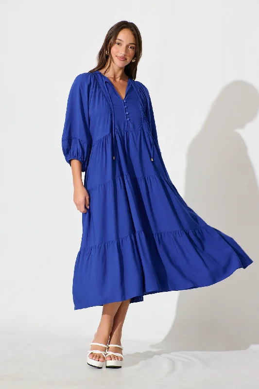 Midi dresses with embroidered accents for a unique and detailed designBarrymore Midi Smock Dress in Cobalt Midi dresses with embroidered accents for a unique and detailed designBarrymore Midi Smock Dress in Cobalt