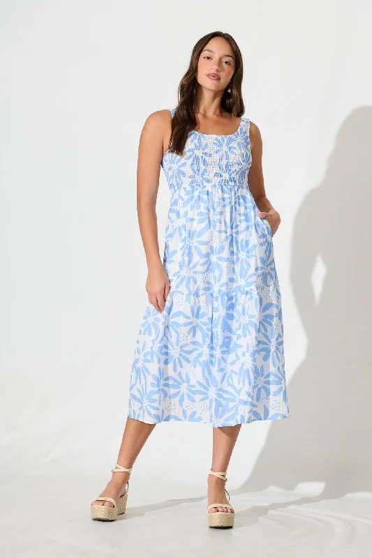 Midi dresses with cold - shoulder cutouts for a trendy styleCaribbean Midi Dress In White with Blue Flower Midi dresses with cold - shoulder cutouts for a trendy styleCaribbean Midi Dress In White with Blue Flower