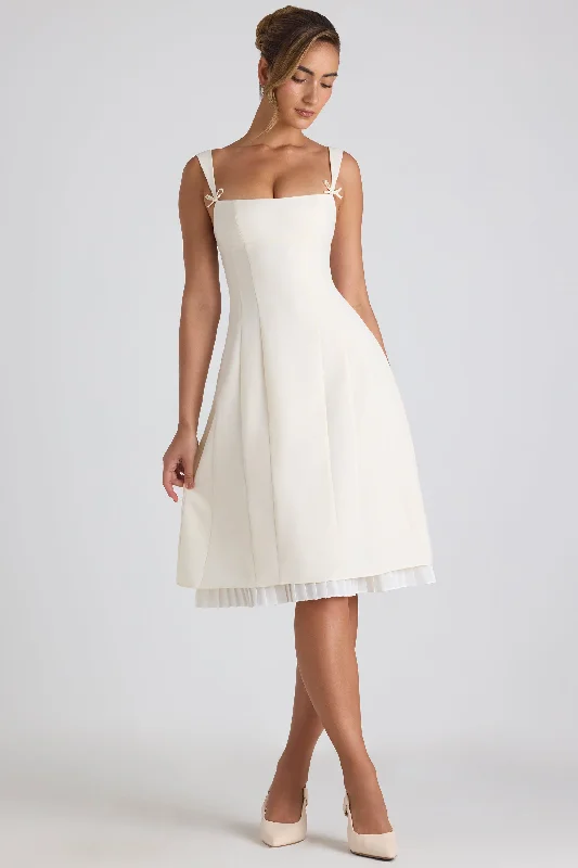 Midi dresses with pom - pom trims for a playful and festive lookBow-Detail Pleated A-Line Midi Dress in Ivory