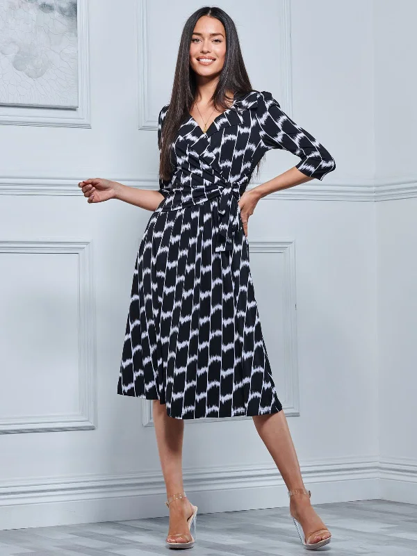 Midi dresses with ruched sleeves for a more fitted and stylish arm lookSylvie Wrap Collar Dress, Black Geo Midi dresses with ruched sleeves for a more fitted and stylish arm lookSylvie Wrap Collar Dress, Black Geo