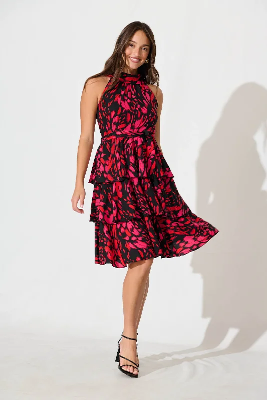 Midi dresses with printed lining for a hidden and stylish detailMariabella Halter Neck Midi Dress in Black with Hot Pink Midi dresses with printed lining for a hidden and stylish detailMariabella Halter Neck Midi Dress in Black with Hot Pink