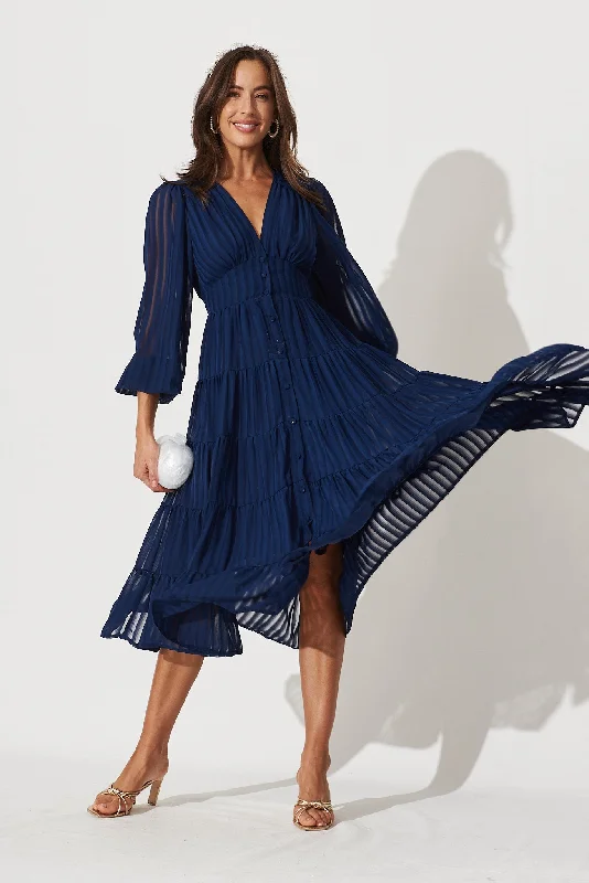 Midi dresses with keyhole backs for a flirty and unexpected detailModical Midi Dress In Navy Chiffon Midi dresses with keyhole backs for a flirty and unexpected detailModical Midi Dress In Navy Chiffon
