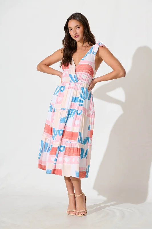 Midi dresses with geometric cutouts for a contemporary and edgy lookShailene Midi Dress in White Multi Heart Print Midi dresses with geometric cutouts for a contemporary and edgy lookShailene Midi Dress in White Multi Heart Print
