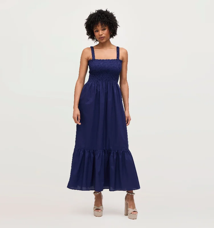 Midi dresses with pleated skirts for a timeless and elegant appealThe Anjuli Nap Dress - Navy Cotton Midi dresses with pleated skirts for a timeless and elegant appealThe Anjuli Nap Dress - Navy Cotton