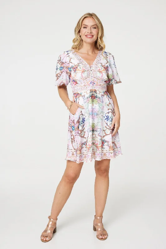 Mini dresses with fringe for a bohemian styleBorder Print V-Neck Empire Mini Dress