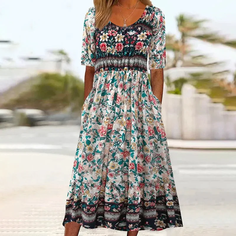 Mini dresses with empire waists for a flattering fitVintage Floral Pleated Dress
