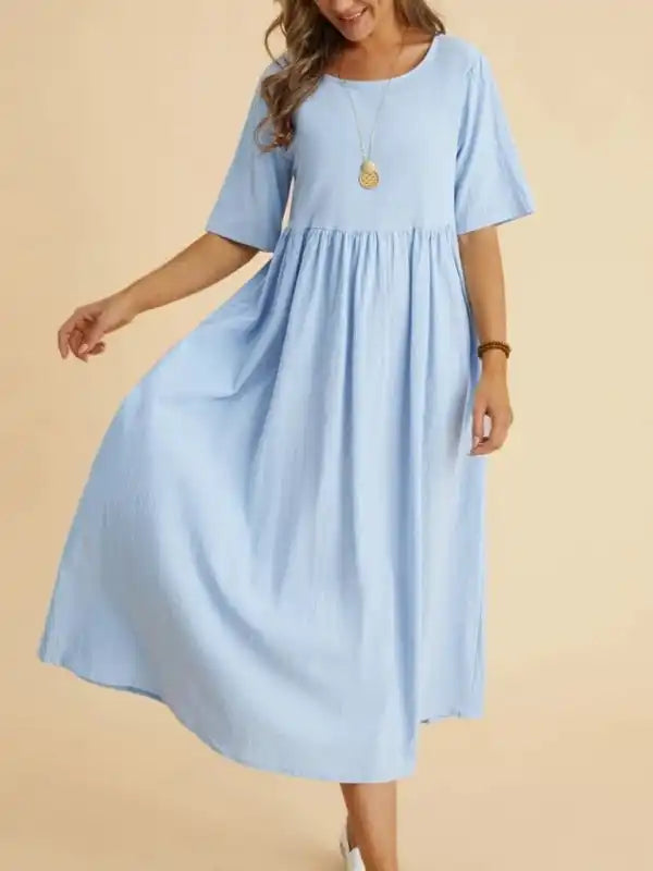 Mini cocktail dresses with a denim fabric for a casual - chic lookLoose Round Neck Half Sleeve Midi Dress