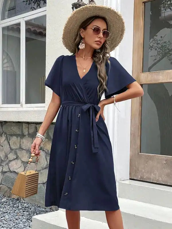 Cocktail dresses with a wrap - around style and a belted waistWomen’s Solid Color Surplice Faux Wrap Button-down Midi Dress Cocktail dresses with a wrap - around style and a belted waistWomen’s Solid Color Surplice Faux Wrap Button-down Midi Dress