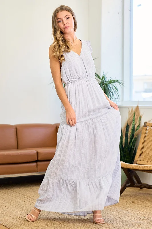 Party dresses with a sheer panel for a hint of allureSleeveless Surplice Tiered Maxi Dress Party dresses with a sheer panel for a hint of allureSleeveless Surplice Tiered Maxi Dress